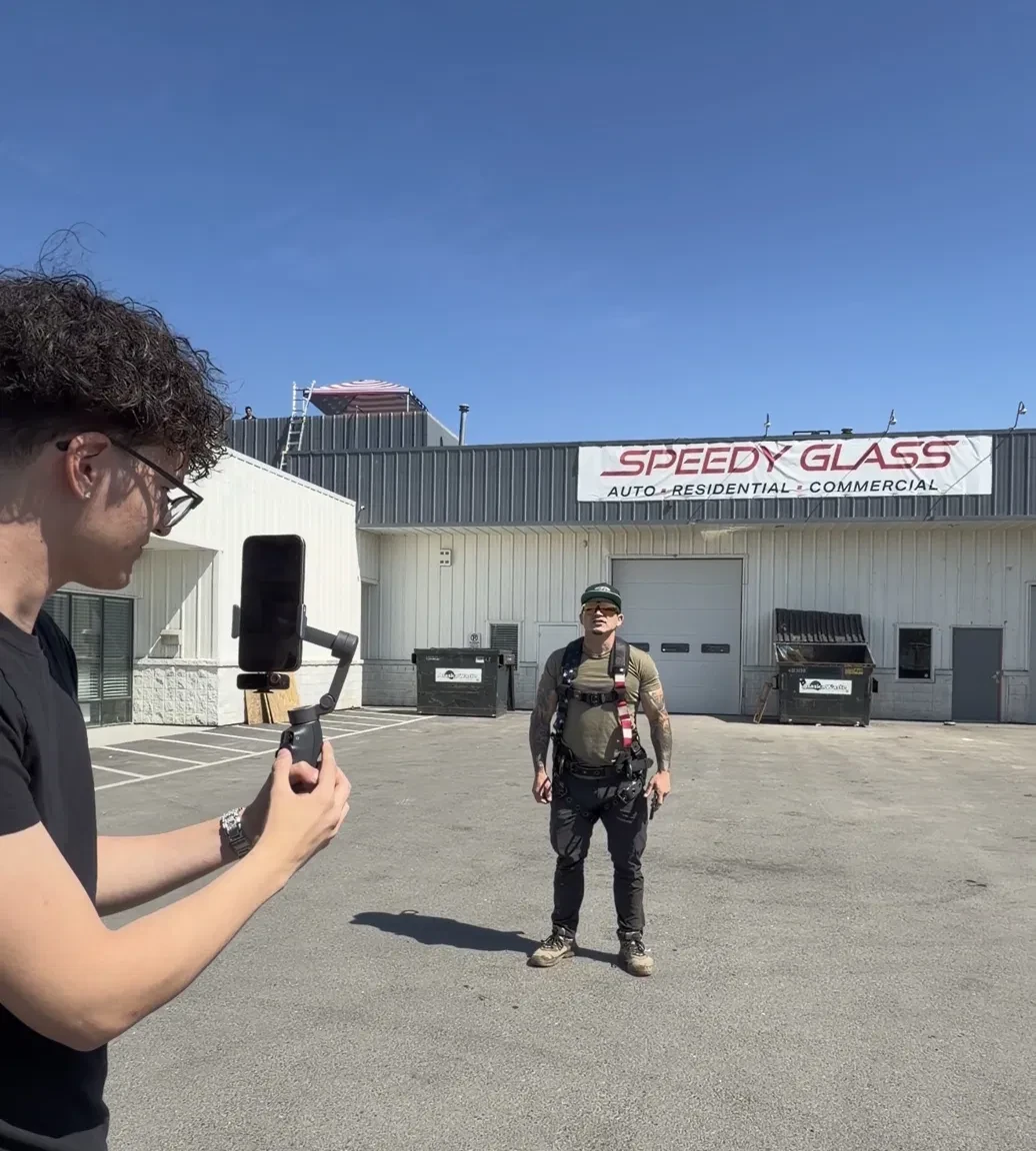 Me filming Great Northern's client outside Speedy Glass. Speedy Glass is the shoot location, not the client brand.